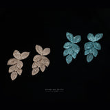 Petal pave earrings